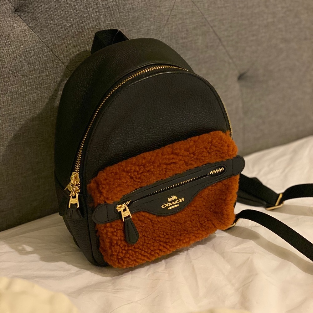 Coach mini backpack. Shearling and leather.
